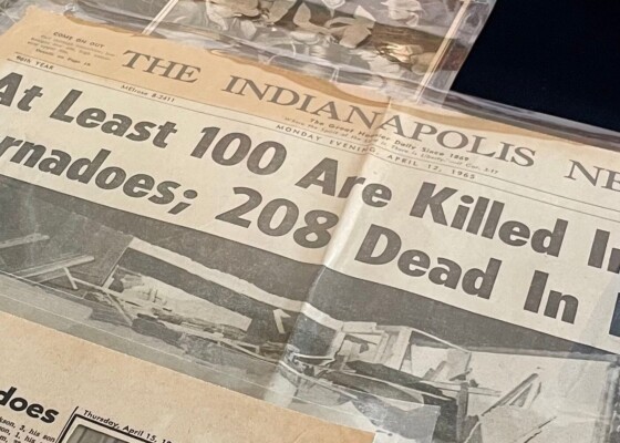 Newspaper headline that says "At Least 100 Are Killed In State Tornadoes"